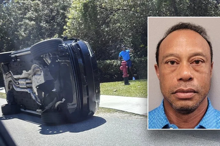 Tiger Woods released from jail after DUI arrest; eyes appear bloodshot in booking photo