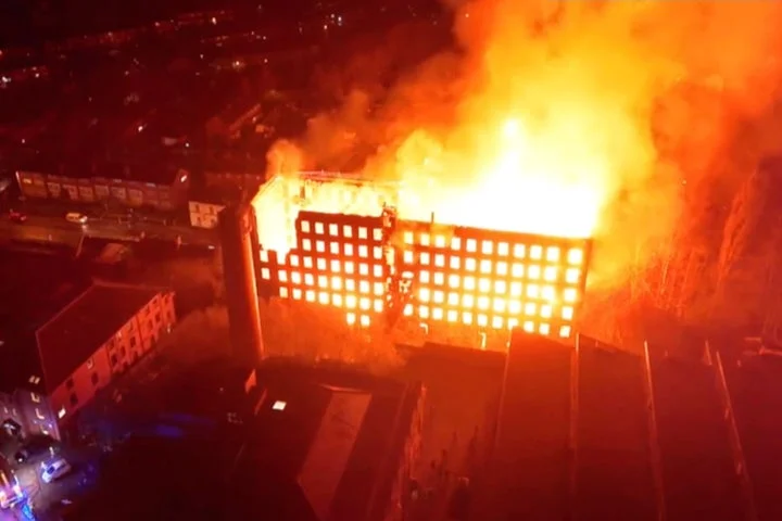 Teenager arrested after fire tears through historic mill