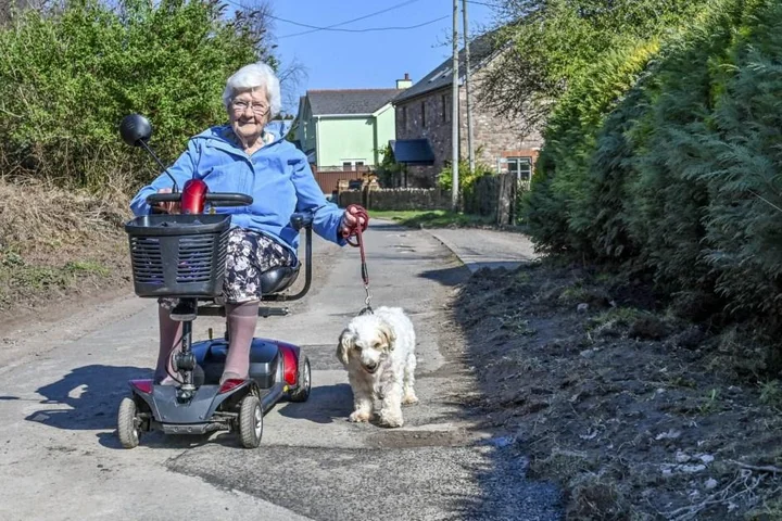 Pensioner overturns and ends up trapped under scooter after hitting pothole