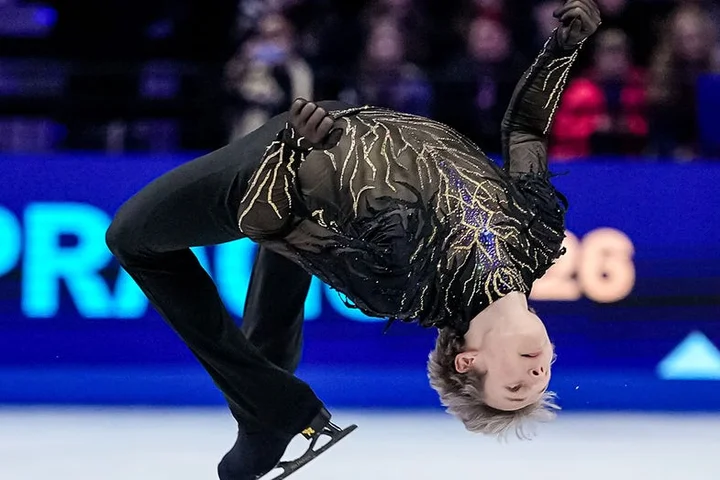 'Quad God' Ilia Malinin avenges Olympic disappointment with backflip for third straight world title