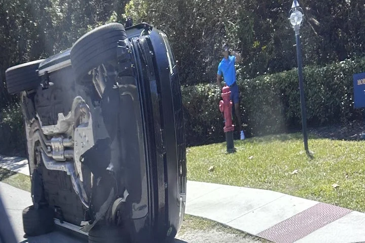 Tiger Woods charged with DUI after crash in Florida, authorities say