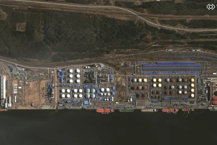 Russia reports fire in new strike on major Baltic port