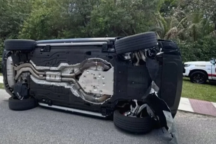 Woods charged and released after Florida crash