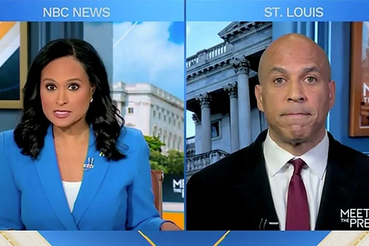 Cory Booker confronted with old clip of himself saying he loves Donald Trump