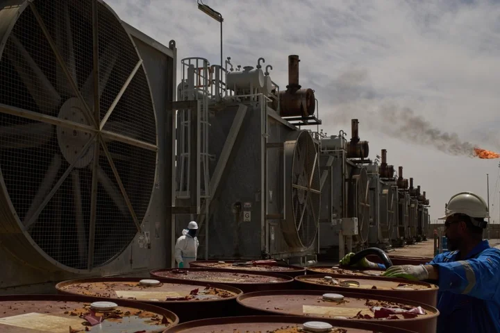 Oil tops $116 a barrel as Iran accuses US of preparing invasion