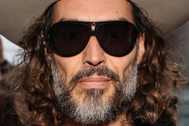 Russell Brand’s rape trial delayed for six months