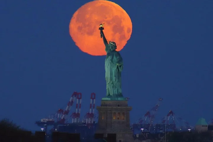 How and when to see a pink moon, a comet and a galaxy this month