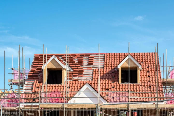 Housebuilder Berkeley to pause buying new land for homes amid global volatility