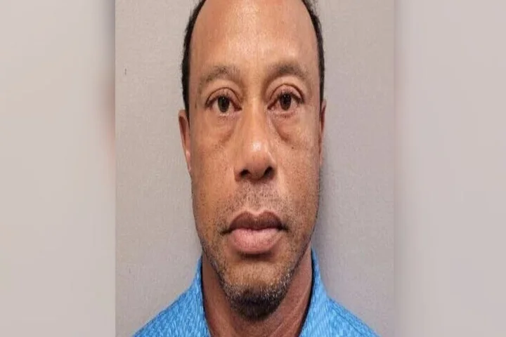 Tiger Woods was "sweating profusely" after car crash, arrest report says