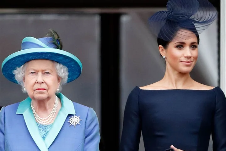 Queen Elizabeth was 'on to' Meghan Markle 'from the start' and viewed her as an 'opportunist': book