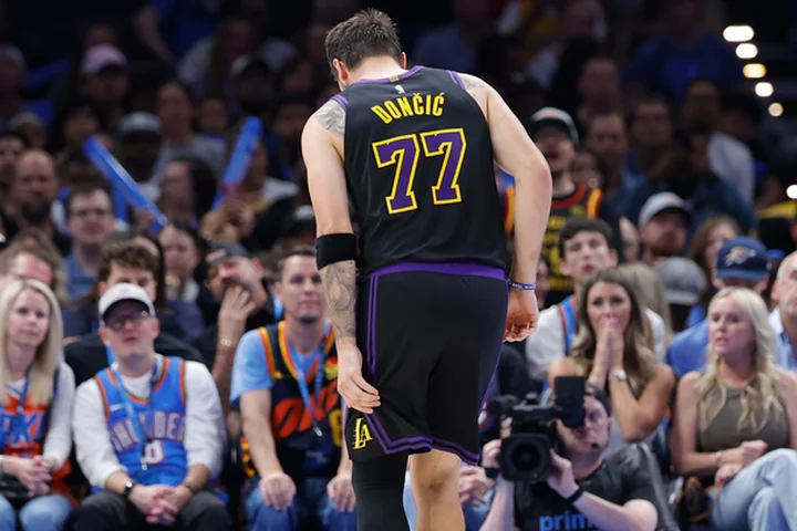 Luka Dončić exits blowout vs. Thunder with apparent hamstring injury that caps miserable night for Lakers