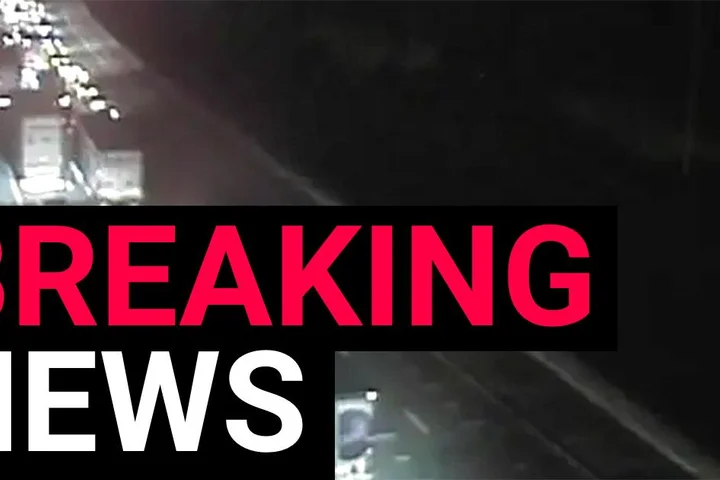 Woman, 23, killed in crash involving three cars and a lorry on M25