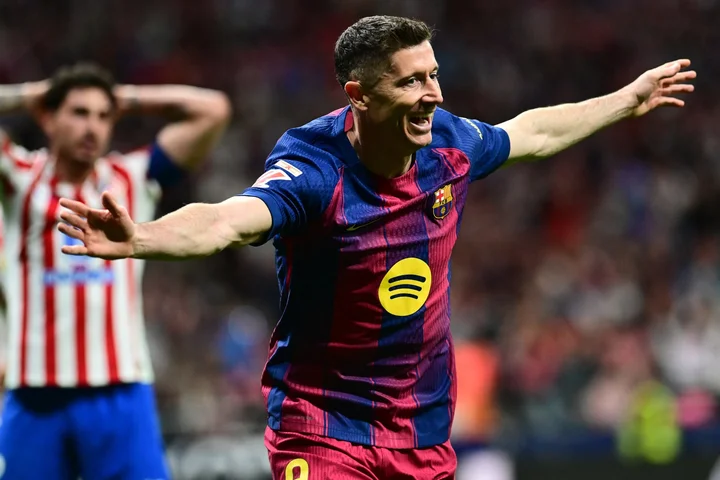 Lewandowski claims late La Liga win for Barcelona at Atletico