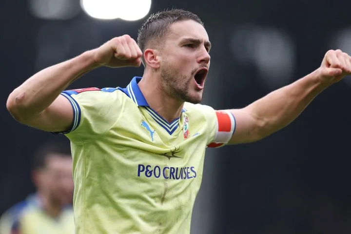 Why are Southampton wearing yellow kit with no names against Arsenal in FA Cup?