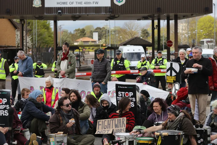 UK police arrest seven protesters near RAF base used by US