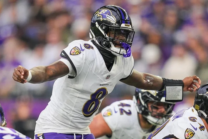 Lamar Jackson reports to first day of Ravens' voluntary offseason workout program