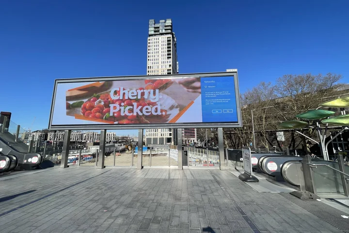 Windows asks a networking question on a Stratford billboard