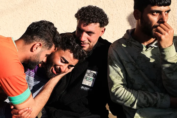 Israeli air strike kills at least 10 Palestinians near Gaza school