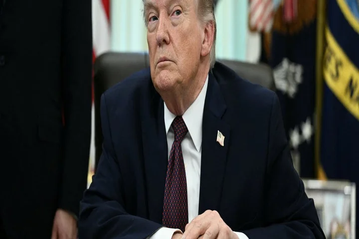 Few Republicans condemn Trump's Iran threat, Democrats call for removal