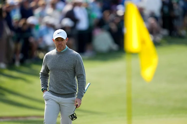 Opening tee times, leaderboard and updates as Rory McIlroy begins title defence