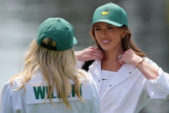 Paulina Gretzky returns to the Masters Par 3 Contest caddying for Dustin Johnson