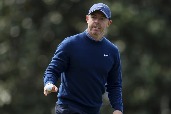McIlroy ties lead after superb start to Masters defence