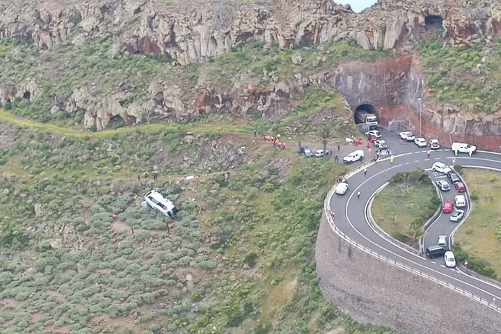 One dead and 27 injured after British tourist bus plunges into ravine