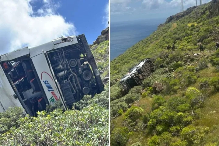 One killed and 14 injured after British tourist bus crashes into ravine in Canary Islands
