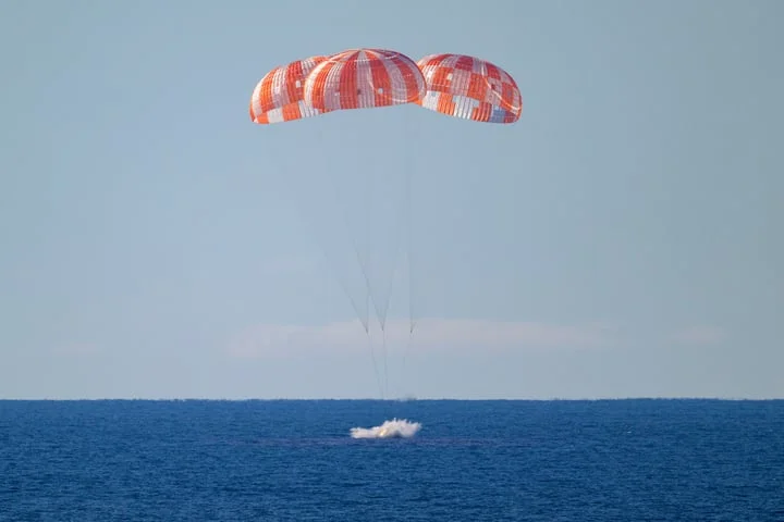 First manned Moon mission in more than 50 years splashes down after epic voyage