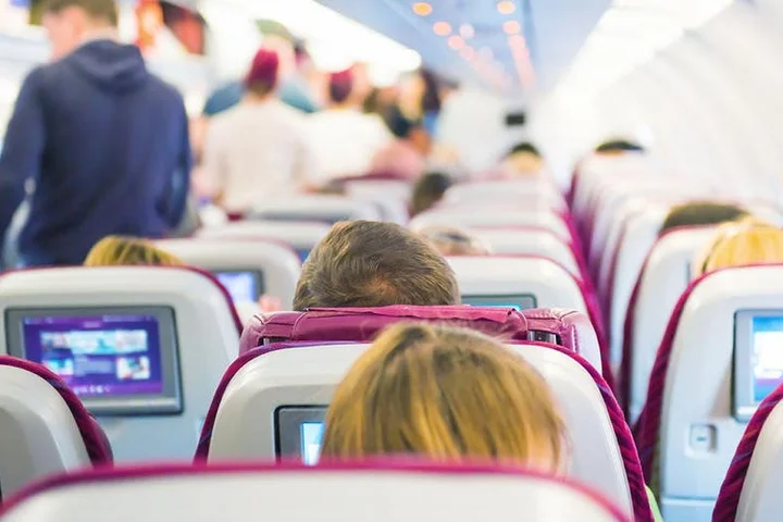 Outraged passengers say parents ditched rowdy kids in coach while they upgraded to first class