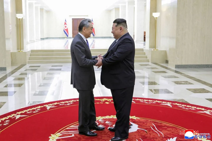 Kim Jong Un shows off friends and weapons before Trump China trip