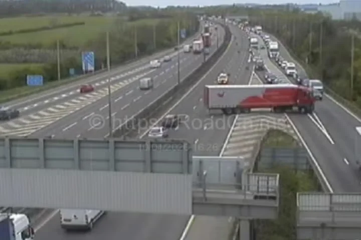 Two teenagers killed after car plunges off bridge and hits minibus on M1