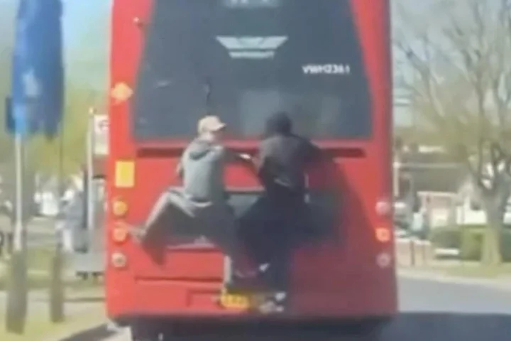 Bus surfers cling onto London number 114 to avoid paying £1.75