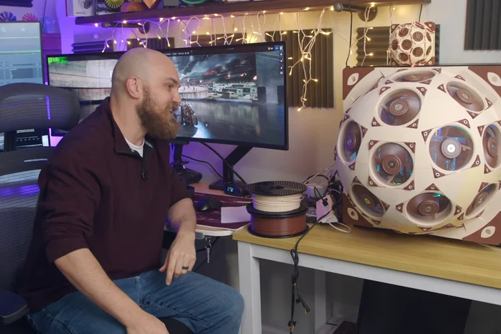 YouTuber builds PC side panel out of 15 Noctua fans and names it the 'Superdome', cuts temps by 20 °C