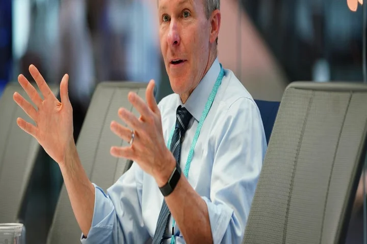 American merger, sources say