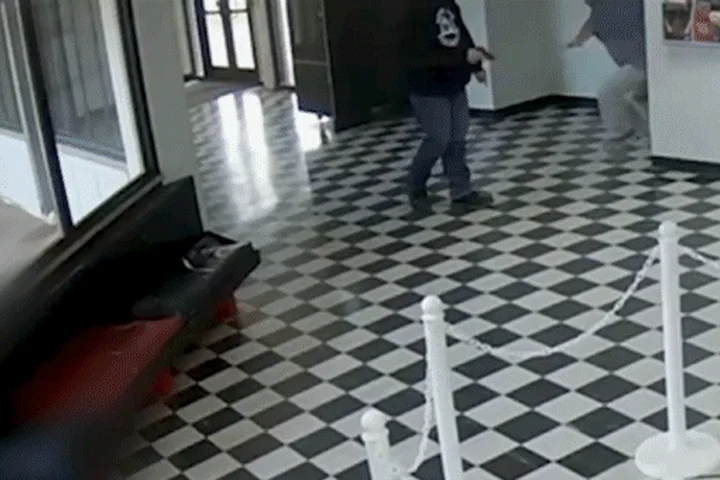 New video shows Oklahoma high school principal tackling gunman who opened fire inside the school