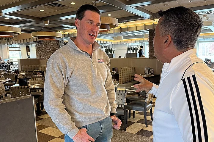 State breakthrough, distances from Trump while taking aim at 'socialist'