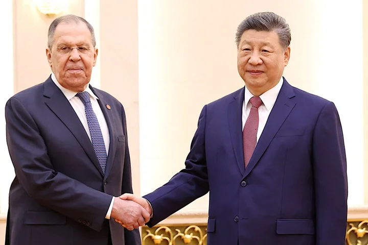 China’s Xi meets Russian FM Lavrov, calls relations with Moscow ‘precious’