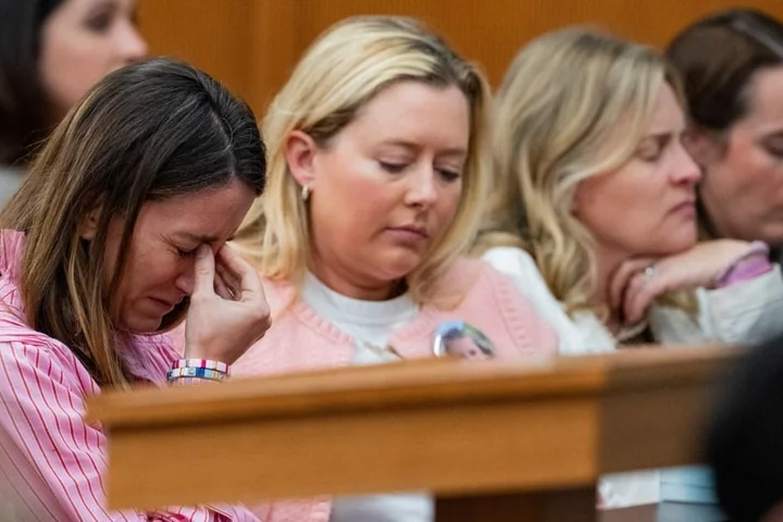 Grieving families plea not to reopen camp where 27 children and adults died in a flood