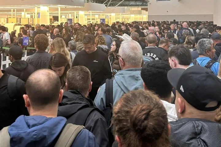 Passengers stranded after two-hour security queues