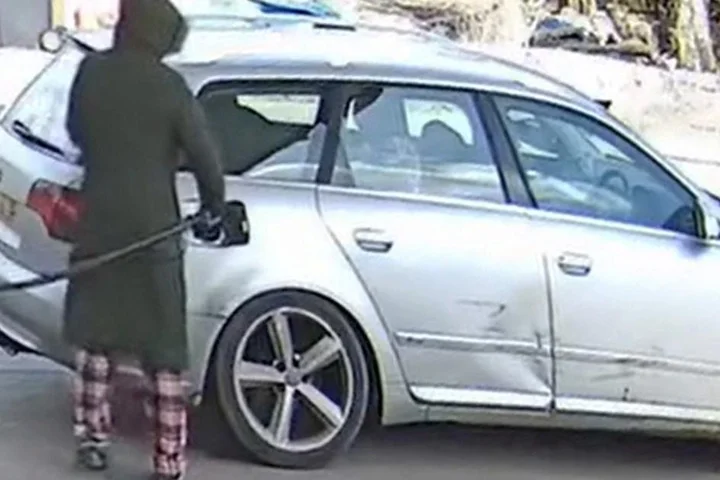 Police release CCTV of woman in pyjamas ‘filling up and driving off’ amid soaring fuel prices