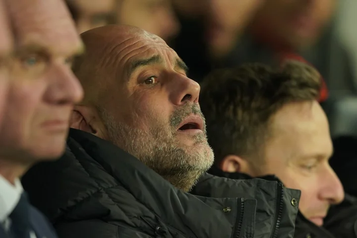 Guardiola says defeat ends Premier League race