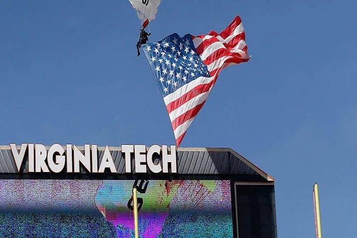 Skydiver rescued after crashing into scoreboard during Virginia Tech game