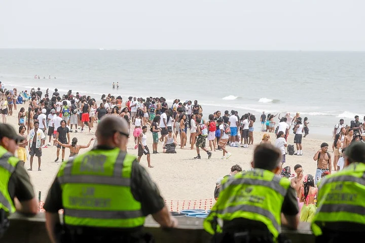 Orange Crush beach blowout nets 26 arrests, cops seize makeshift machine gun as massive crowd tests crackdown
