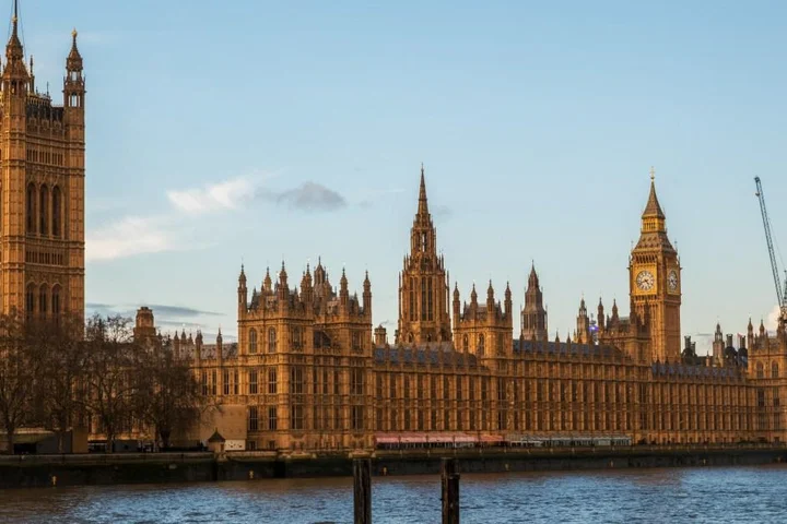 Counter terror detectives arrested for former staff member at an address in