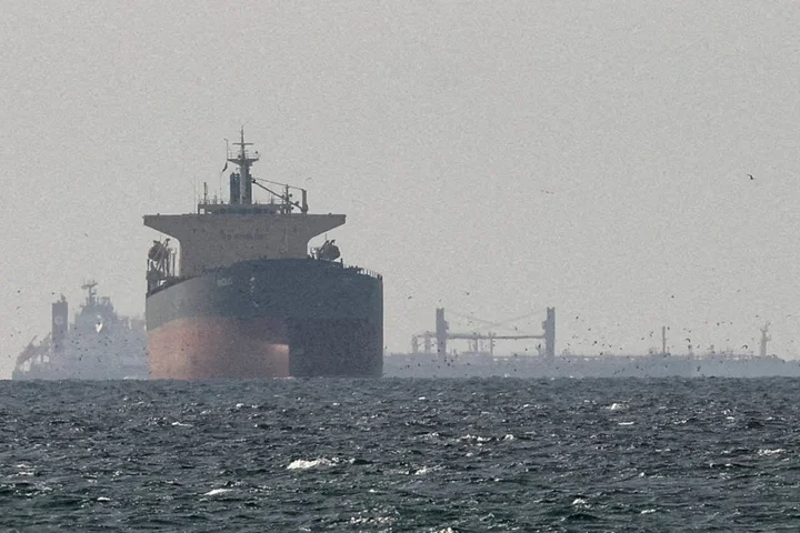 Iran seizes two vessels in Strait of Hormuz after ship comes under fire