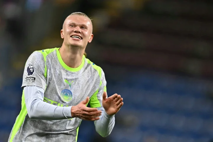 Manchester City go top of Premier League as Burnley relegated