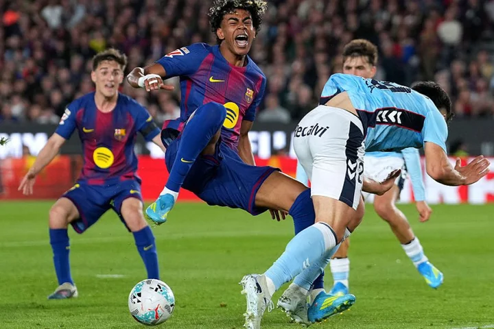 Yamal scores but injured as Barcelona beat Celta to restore La Liga lead