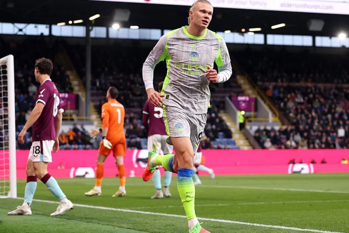 Man City topple Arsenal at Premier League summit with nervy win at Burnley