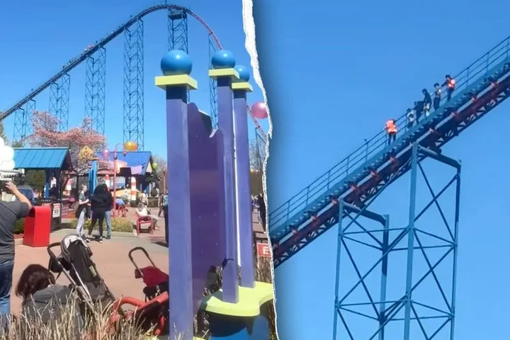 Panic at popular theme park as stranded riders scramble to escape broken roller coaster